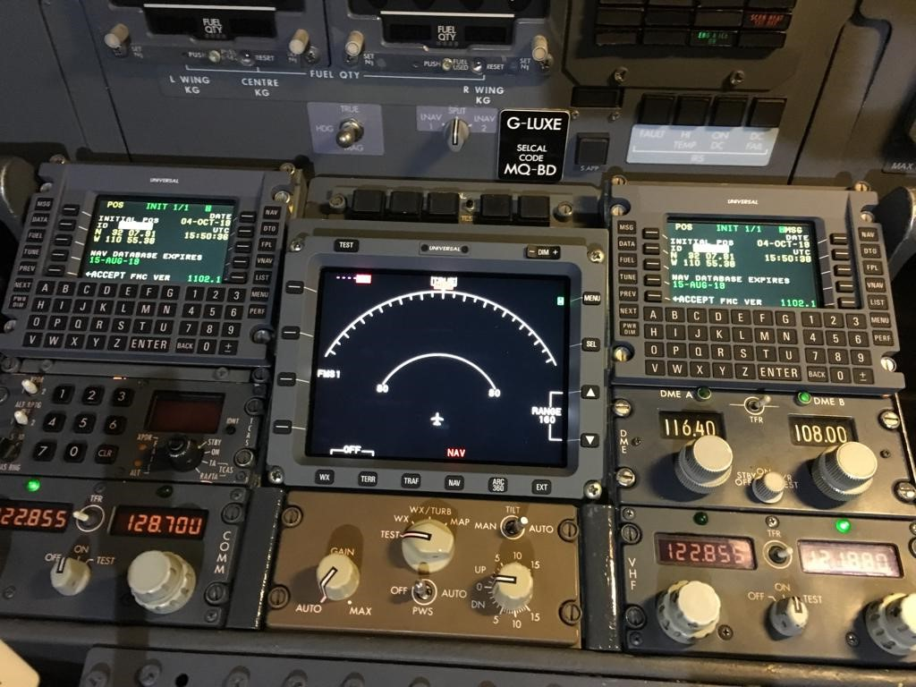 Dials, buttons and screens in an aircraft cockpit