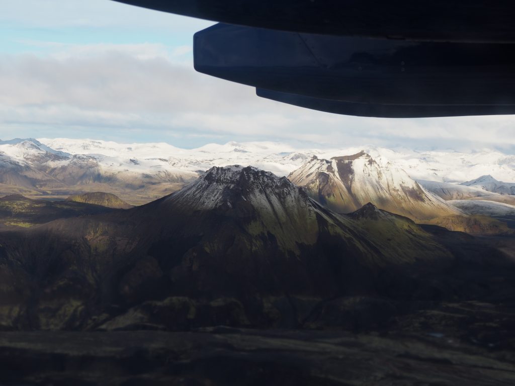 View from the window of a research aircraft as it flies over volcanoes in Iceland
